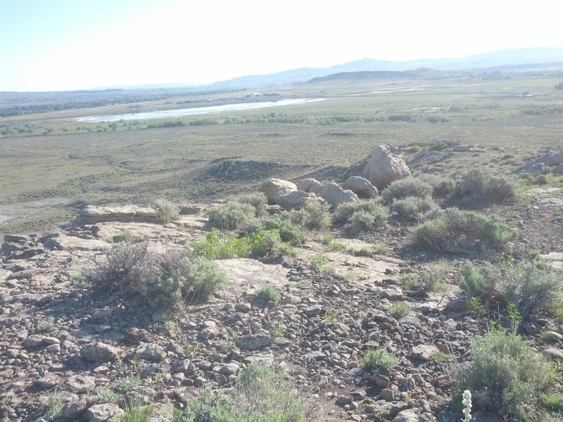 The top of "Oly's". There is some difficult terrain in here. There are many line options. Aim for the jumble of boulders in front of you and stay towards your left. The plan is to turn this ridge into a free ride area in the next year or two.