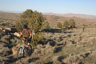 Very near the top of Twisted Sister with the McCullough Peaks and the Big Horn Mountains in the background.