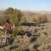 Very near the top of Twisted Sister with the McCullough Peaks and the Big Horn Mountains in the background.