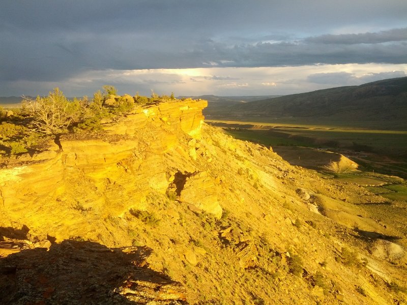 A bit of that magic sunset light on Above the Law looking down over the town of Cody.