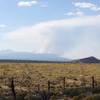 Cascade Range with Pole Creek Fire in the distance.