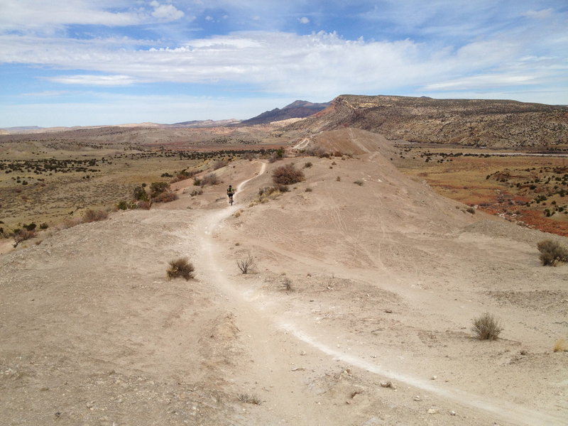 Continuing out along the ridge, definitely try to stay on the trail, the soil take a long time to cover up errant tire tracks.