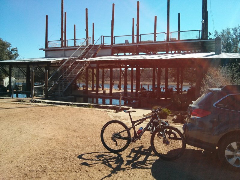 View from the parking lot out to the pavillion (with roof deck access) and lake behind.