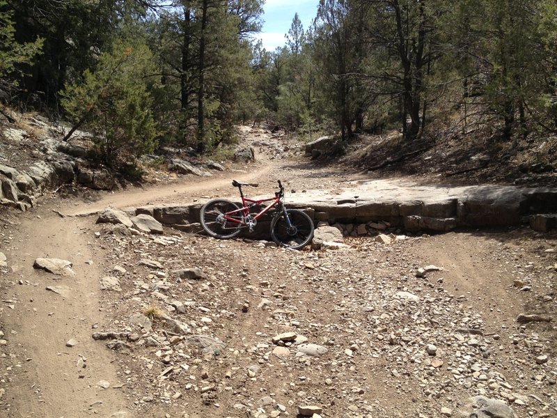 Natural ledge drop in the bottom of the canyon, you could ride around it but why?