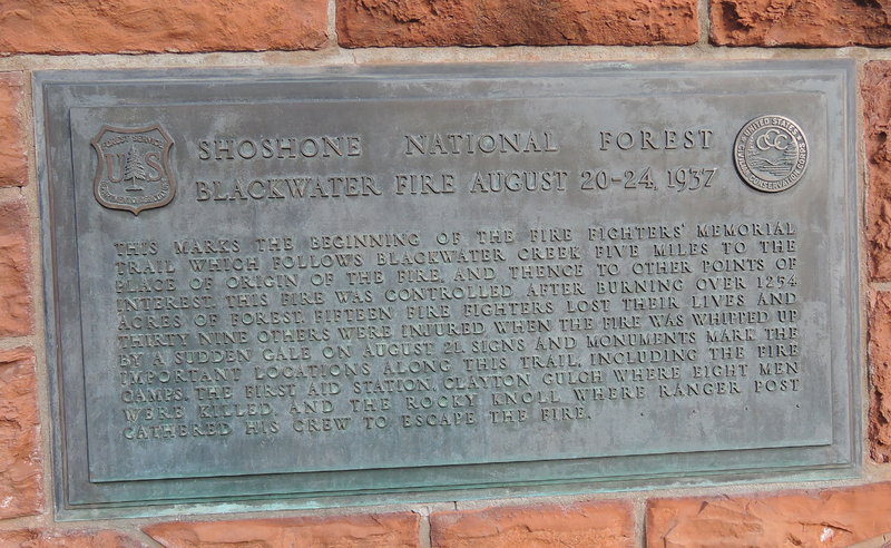 Plaque on the backside of the Fire Fighter's Memorial explaining the tragedy and the trail.