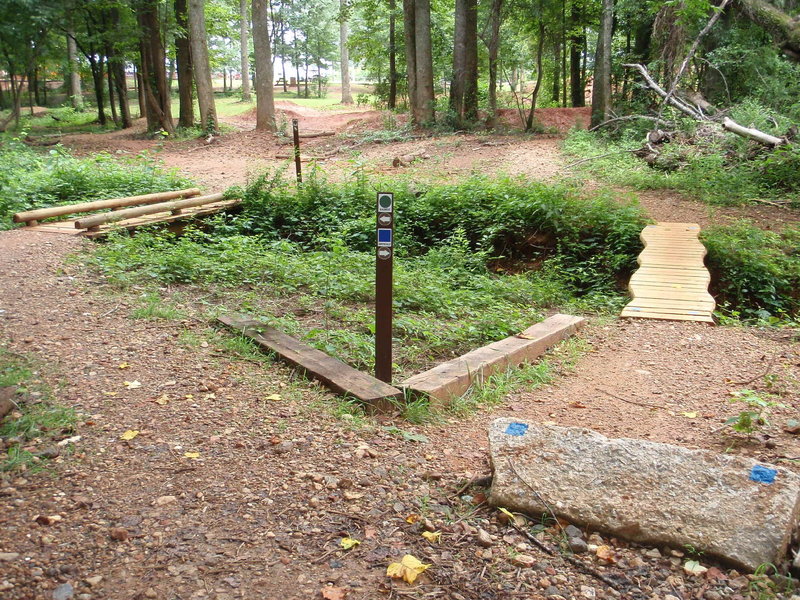 looking at two bridges, heading toward bottom of pumps, berms, and rollers trail