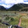 View from Moore Open Space trail, looking southwest.  Left to right: Aspen Highlands, Pyramid Peak, Buttermilk Mountain (Tiehack side).