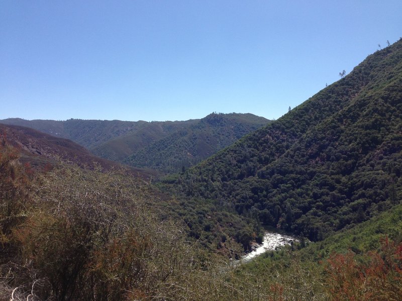 View back at the Tuolumne river and lumsden road on the right side of the river canyon.