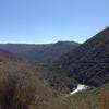 View back at the Tuolumne river and lumsden road on the right side of the river canyon.