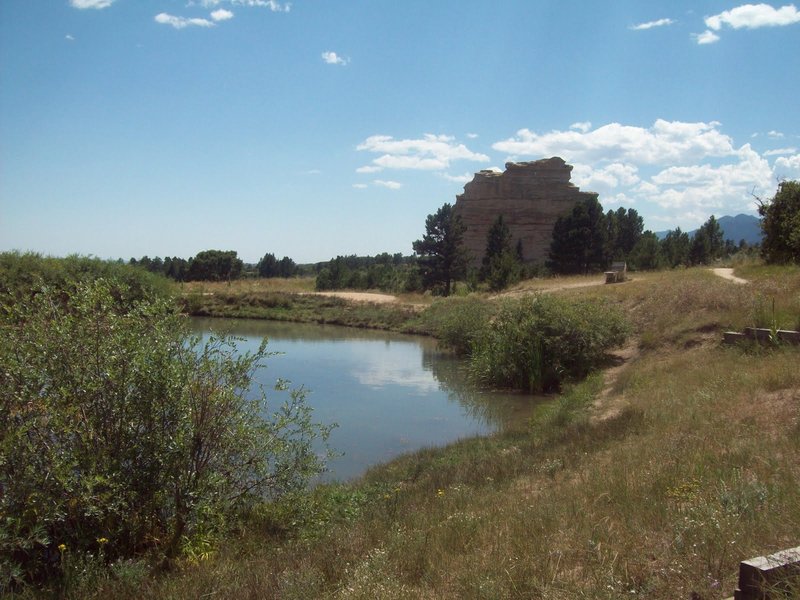 Ground-level view of Monument Rock, looking south from below Mt Herman Rd.   The Rock makes a great landmark for navigating within Monument Preserve and Mt Herman.