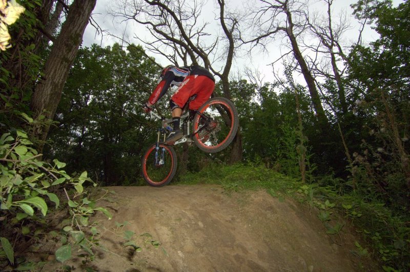 Rider getting air off the tabletop jump.
