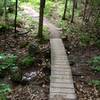 Gently curving bridge on Hillside Trail.