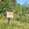 U.S. Forest way marker showing direction from the Putt Putt trail to other trails in the Cache Creek drainage.