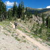 Riding at the base of Andesite Peak after a tough forest climb on the Hole in the Ground Loop.