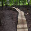 This is a bridge feature built using a fallen tree. It's  nearly 2 feet wide, and 3 feet tall.