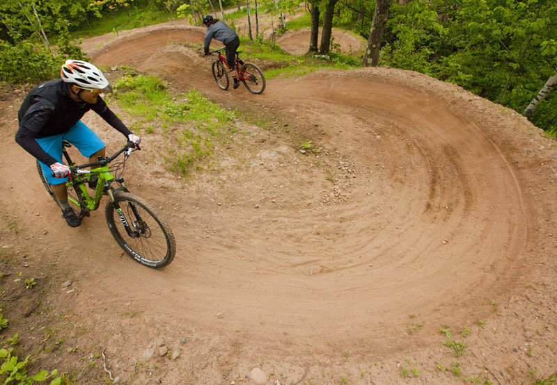 A quick and deep series of berms on the upper reaches of Candyland