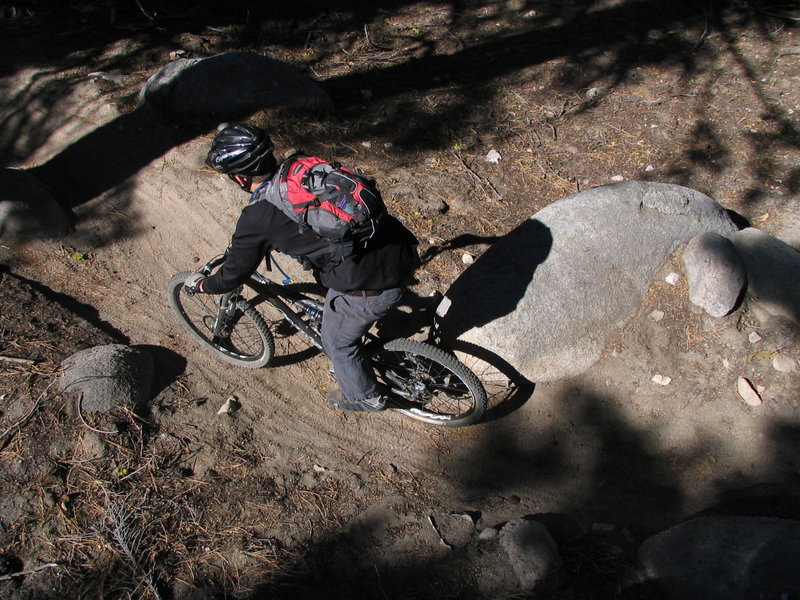 Bucky winding his way through the boulders during a late-season ride along the Tahoe Rim Trail.