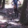 Tara riding the rock bridge.