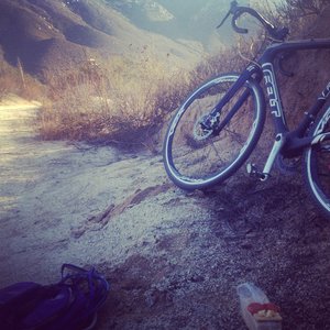 Taking a break after a steep climb. Grade was too much for the road gearing.