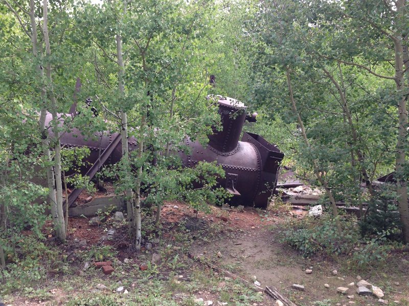 Old mining equipment at intersection with 105 4WD road.