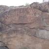 Native American Petroglyphs opposite the murals.