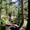 Flying down on of the many narrow, rocky sections of singletrack