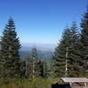 View from Mary's Peak Parking lot. Hazy day. Corvallis, Oregon in foreground, Cascade Volcanoes in the background. Ride up the road for a phenomenal 360 degree view on a clear day