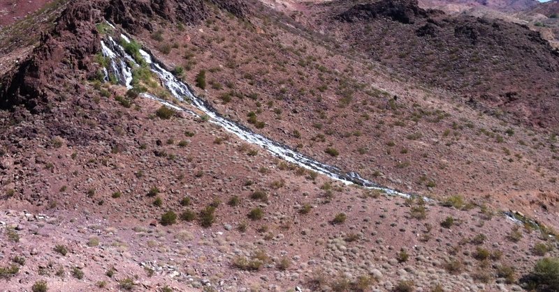 Rare desert waterfall...Hmmm...almost like someone put it there...