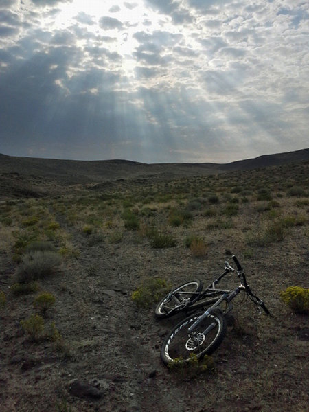 Sunlight filtering through the clouds on the lower end of the loop