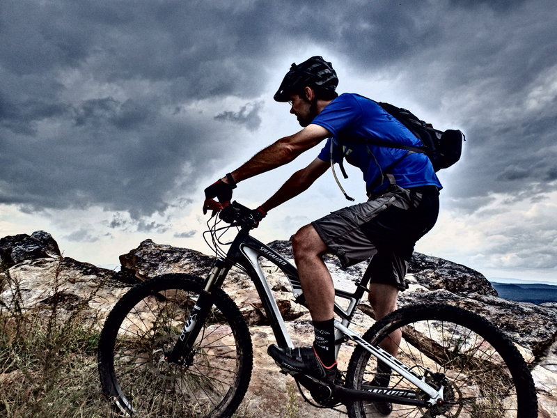 Watching the storm clouds roll in at top of Buzzard's Roost.