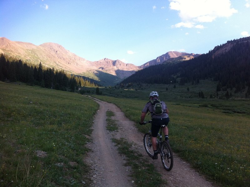 Riding a smoother section of the upper Lincoln Creek Rd.