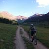 Riding a smoother section of the upper Lincoln Creek Rd.