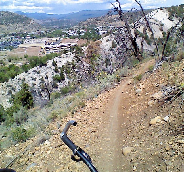 Descent towards Carbon Junction with a sharp ridge and Durango in the background