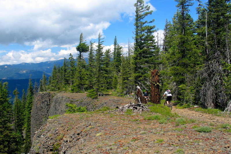 Riding along the rocky cliff edge on the Little Bald Mountain Trail.