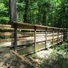 The new steel span bridge on the 3 Bridges Trail. The Forestry Dept provided the bridge and material and the local bikers installed the decking