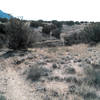 Here an abrupt descent crosses the arroyo and then winds up the other side