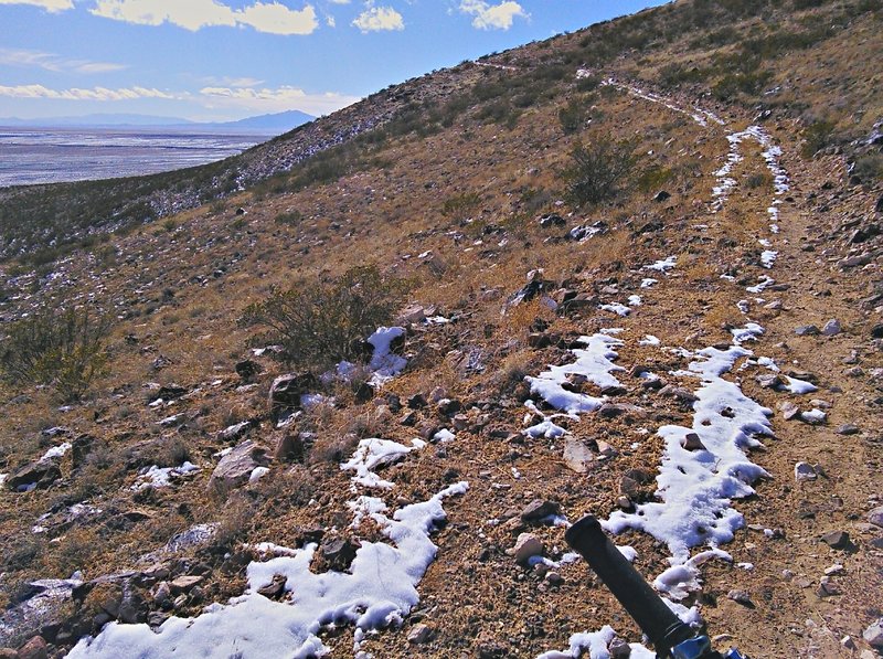 Steady ascent towards the south Cerro peak. The trail is wide but studded with rocks.