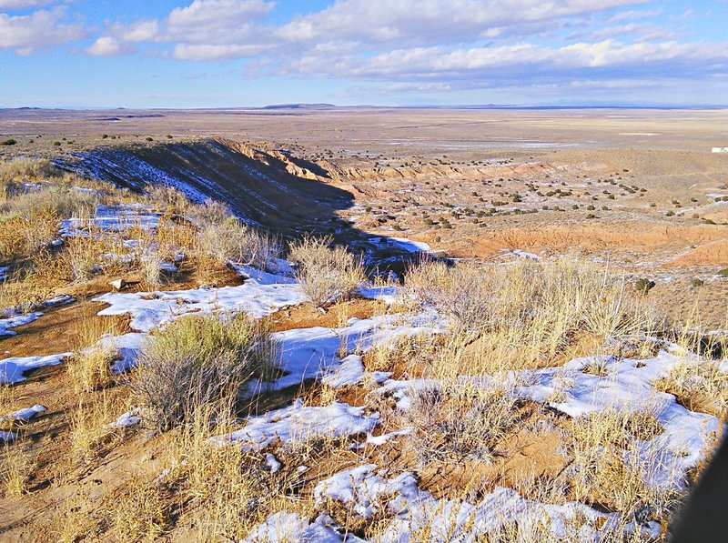 Trail skirts this escarpment. Below it the "bowl" area of El Cerro de Los Lunas Preserve.