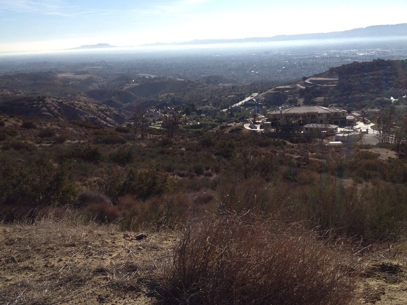 Looking back at the San Fernando Valley and some very large mansions in the area