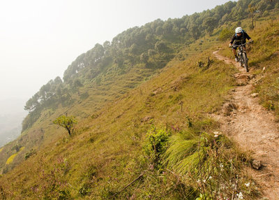 Approaching the staircase high above terraced fields.