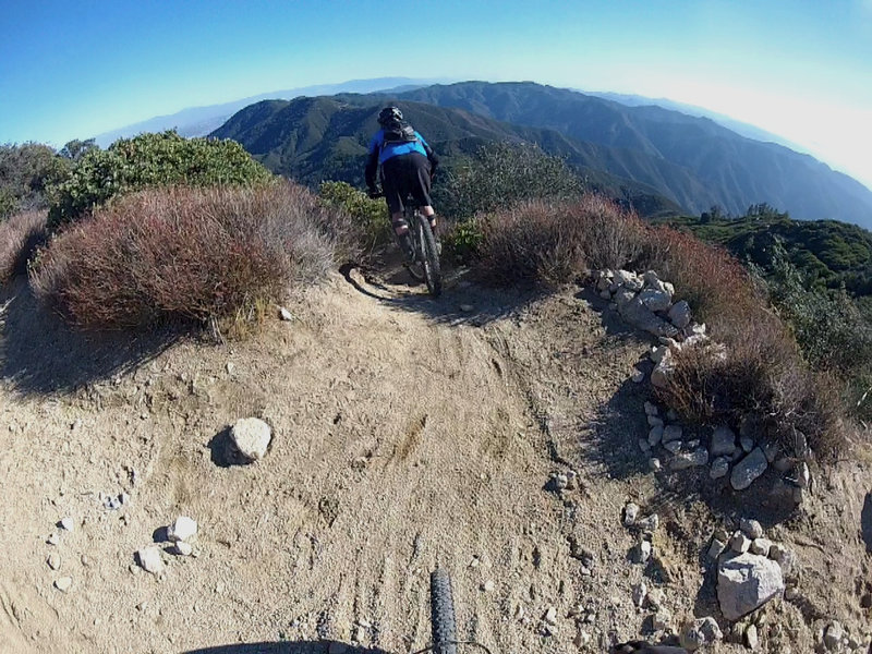 Hold on! This is the start of a crazy drop into a trail you'll want to come back to over and over again.