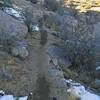 East side of the Four Hills butte is mostly smooth but a few embedded boulders and a steep cross-slope require focus on the trail