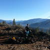 Adrian atop the summit, enjoying the view