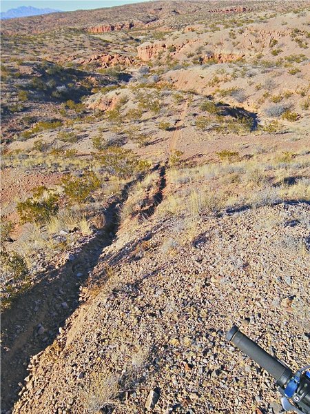 Steep, loose, and eroded climb out of the arroyo