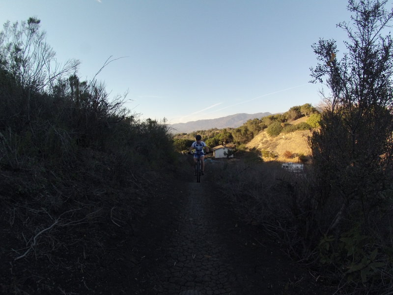 Climbing switchbacks from the upper parking lot