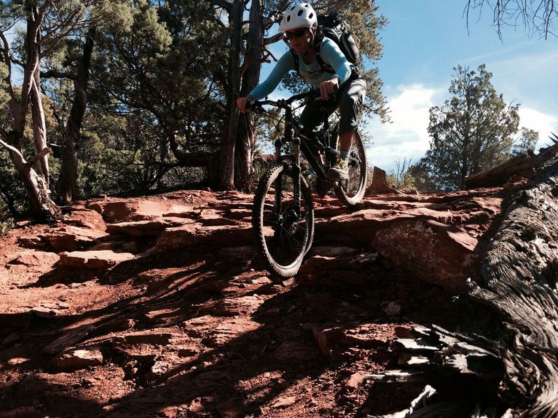 Dropping a small ledge on the Jordan Trail