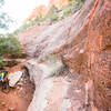 Riding through and endless seem of overhanging slickrock - the feature that gives this trail its name.