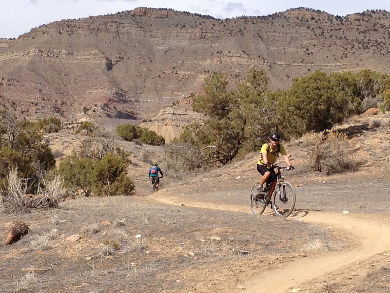 Cruising up the mellow, twisty, desert climb.