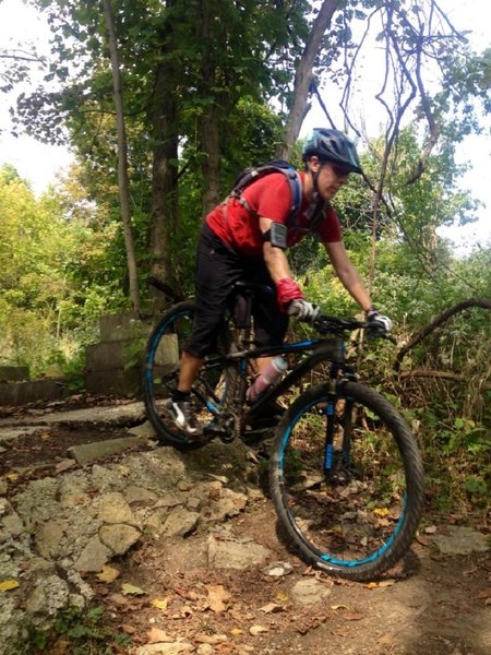 Riding over the foundation on the A trail