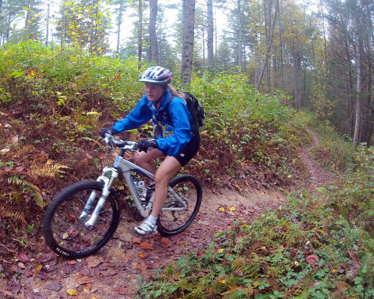 Annie Brown cruising up Tillman West Trail after riding up from the Stokesville Lodge / Ride Center at IMBA Fallfest 2013